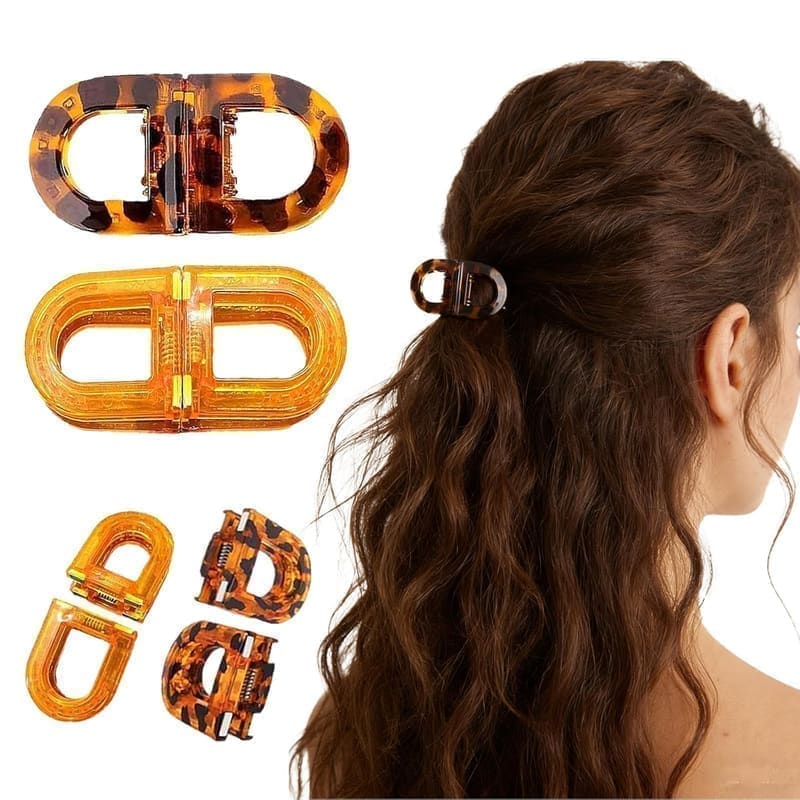 Magnetic hair clips for women pack of 2 hero shot — two 2-in-1 section claw clips in an orange-and-brown leopard print on a white background, showing the magnetic catch and the claw teeth