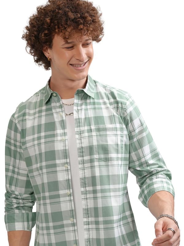 Highlander Men's Cotton Slim Fit Checks Shirt in light pink and white checks pattern on model, showing full-sleeve regular-collar casual cut