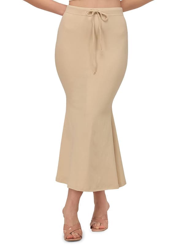 Mehrang stretchable saree shapewear petticoat in beige showing mermaid silhouette