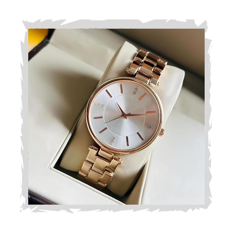 Styledose NEW KC 1 women's watch front view with stone-studded dial and rose gold bracelet strap