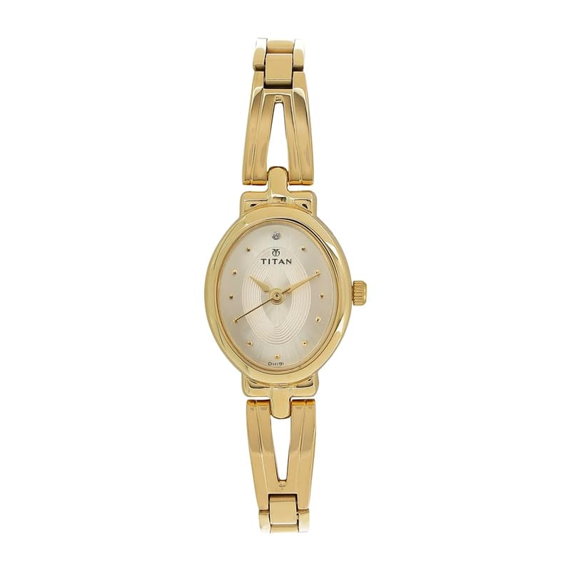 Titan Karishma Revive NM2594YM01 front view with oval gold case, champagne dial and open-link bracelet