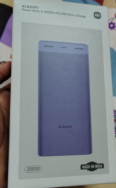 Xiaomi Power Bank 4i 20000mAh in black, top-down view showing the matte-finish shell and Mi logo